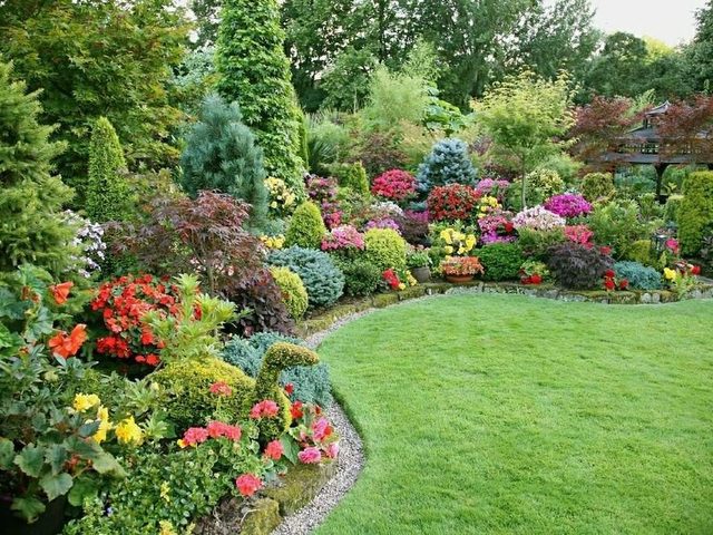 Landscaped garden with colourful planting and neat lawn